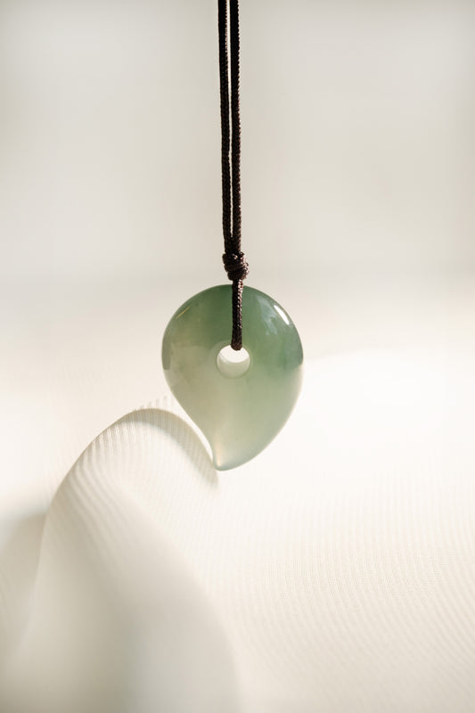 Pale Bluish Green Jadeite Comma with White patches