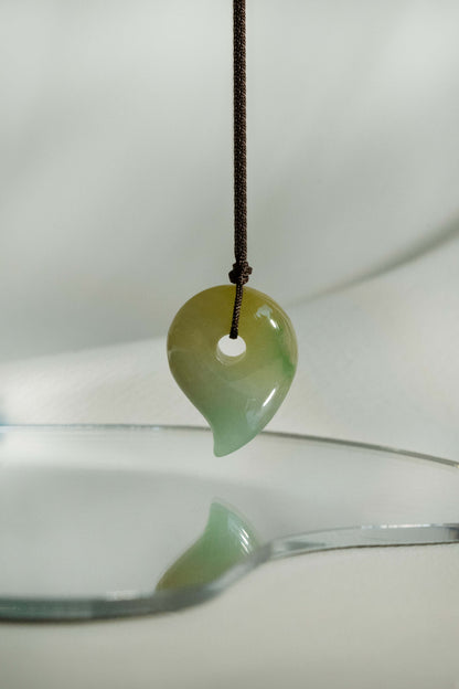 White Jadeite Comma with Light Green and Brownish Yellow Patches