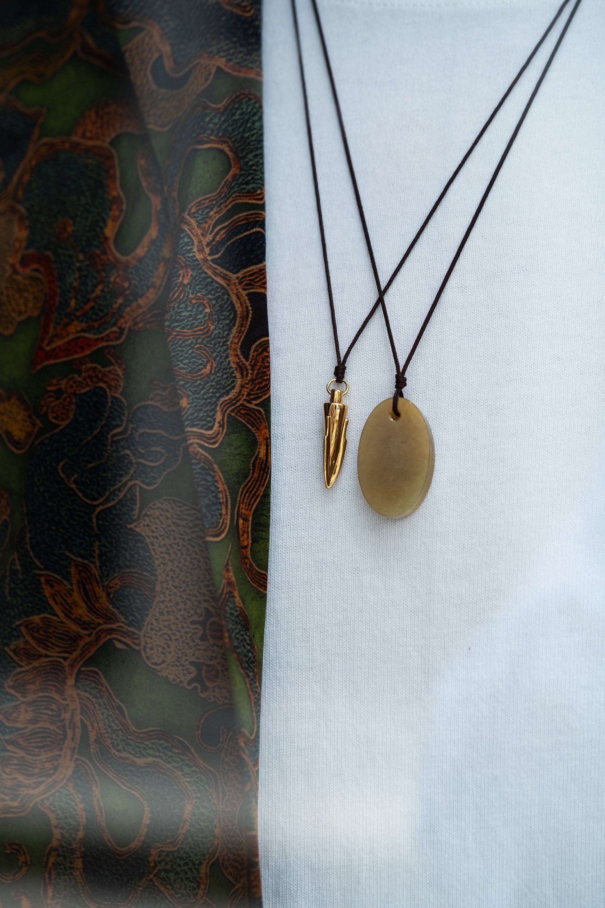 Oval Brownish Yellow Jadeite Tag with White patches