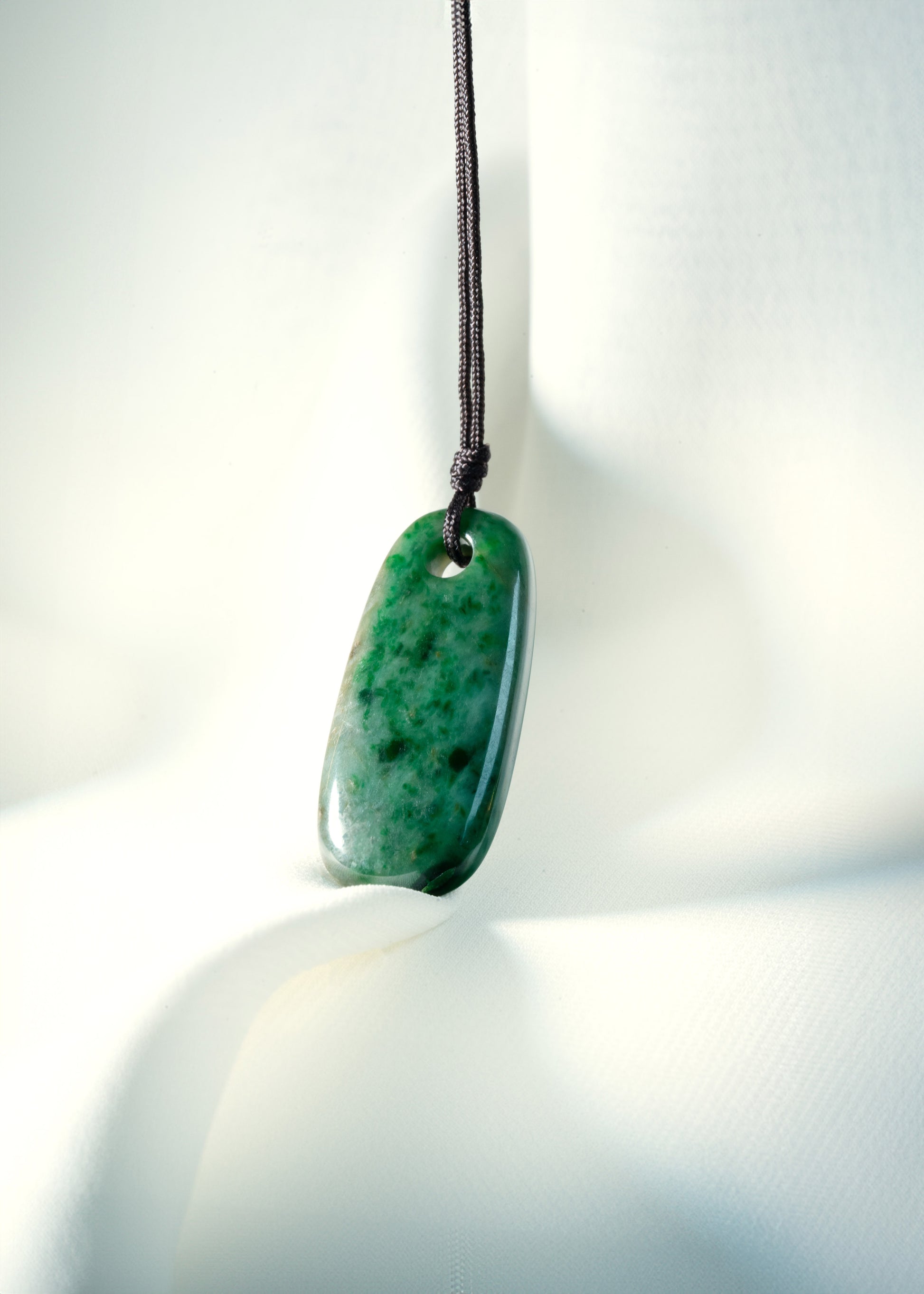 Light Green Jadeite Oval Tag with Grey and Intense Green Patches