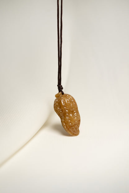 Brownish Yellow Carved Jadeite Peanut Pendant in Small Size with Adjustable Knot