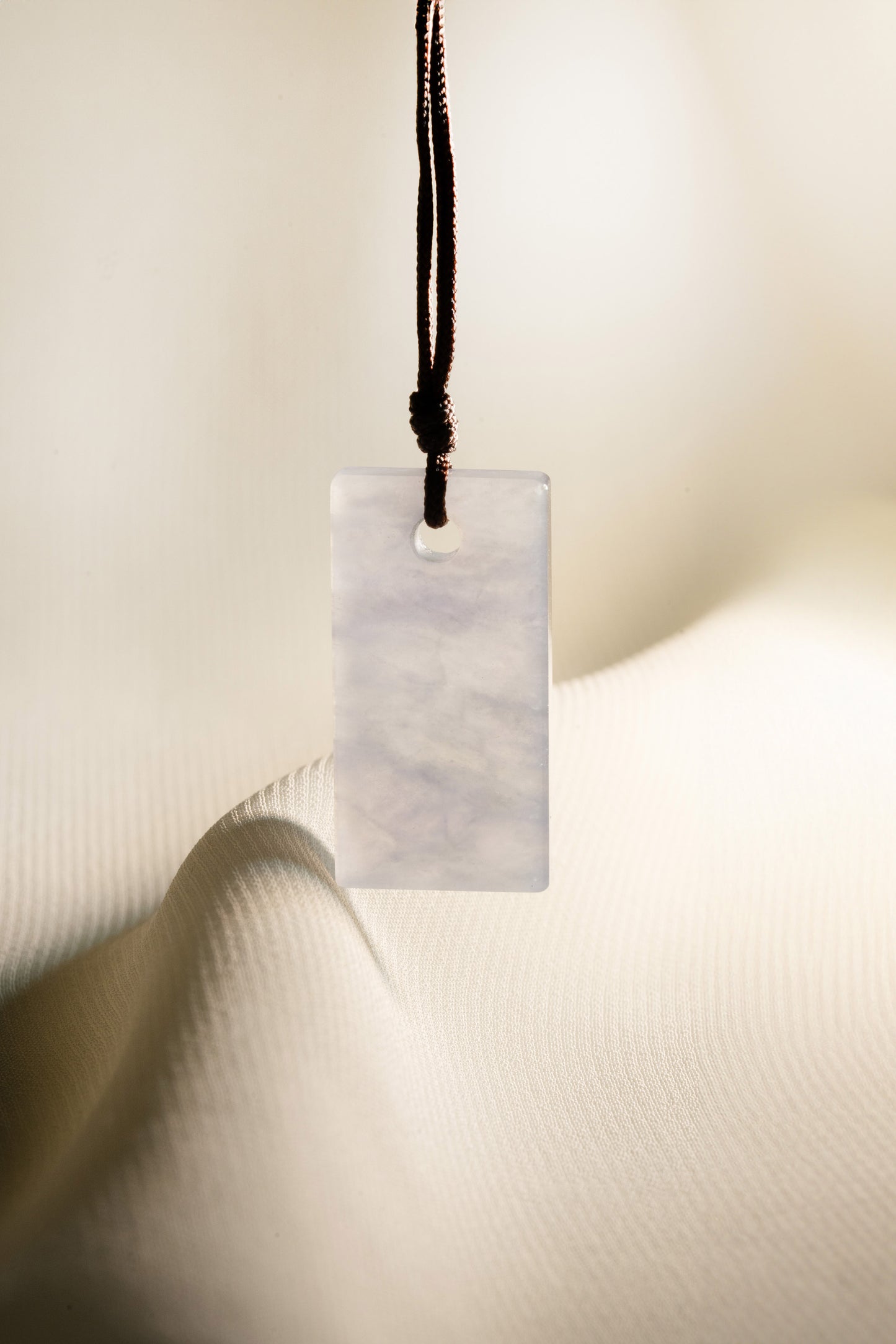 White Jadeite Tag with Pale Purple patches
