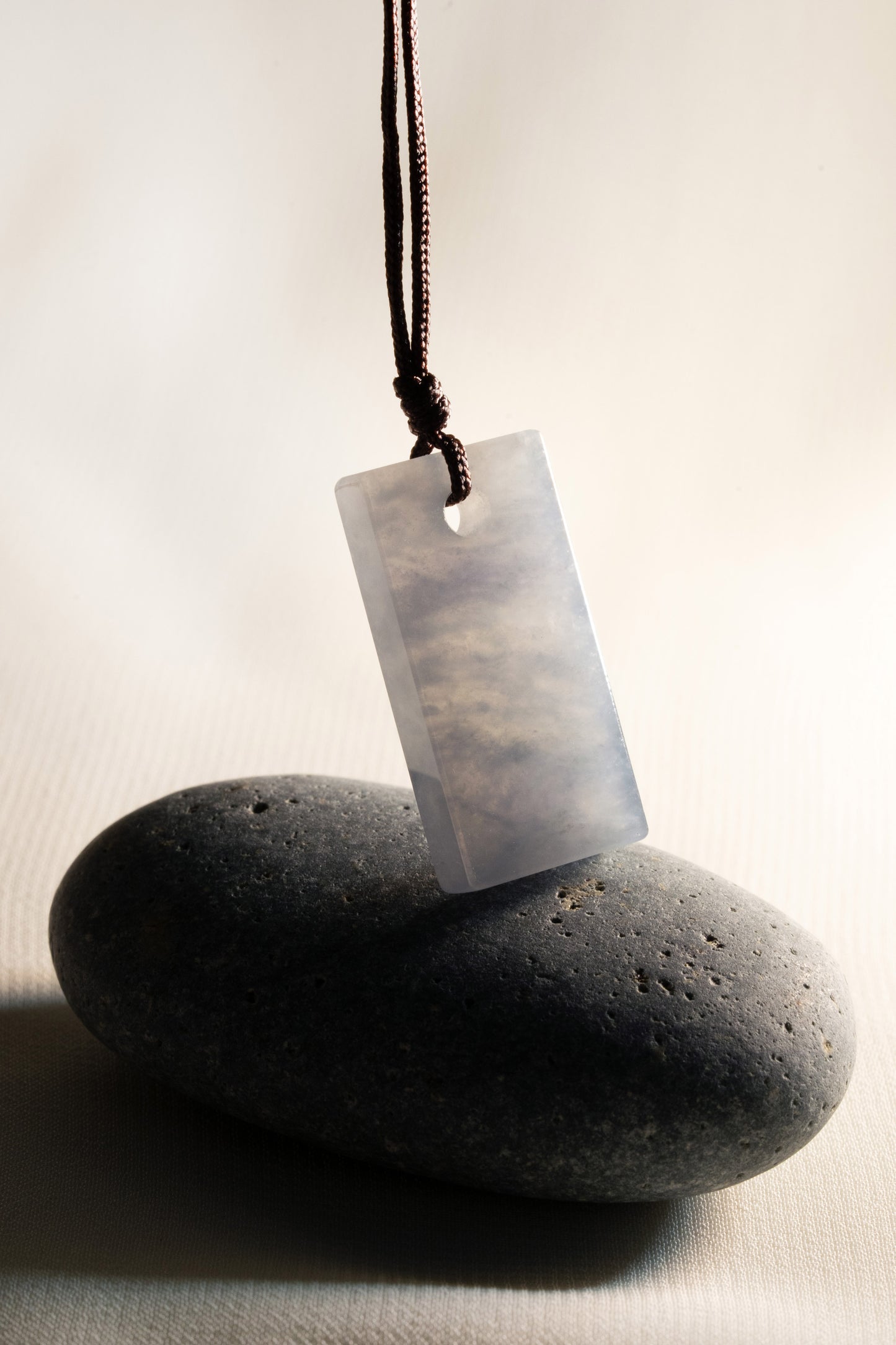 White Jadeite Tag with Pale Purple patches