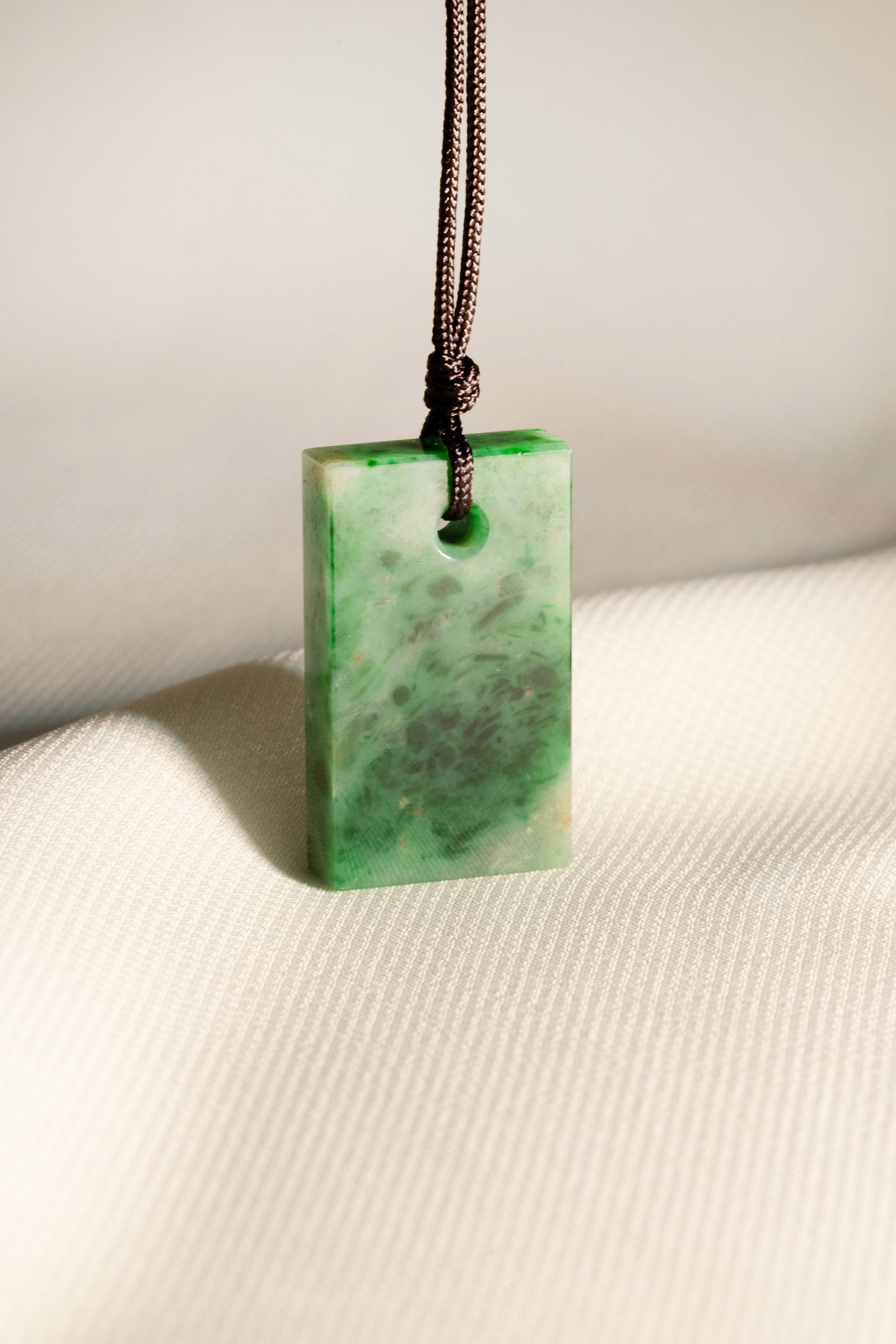 Intense Green Jadeite Tag with Pale and Deep Green patches