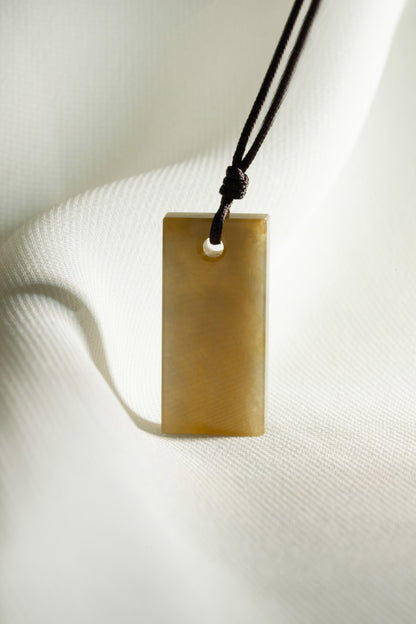 Brownish Yellow Jadeite Tag with White patches