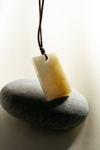 Brownish Yellow Jadeite Tag with White patches