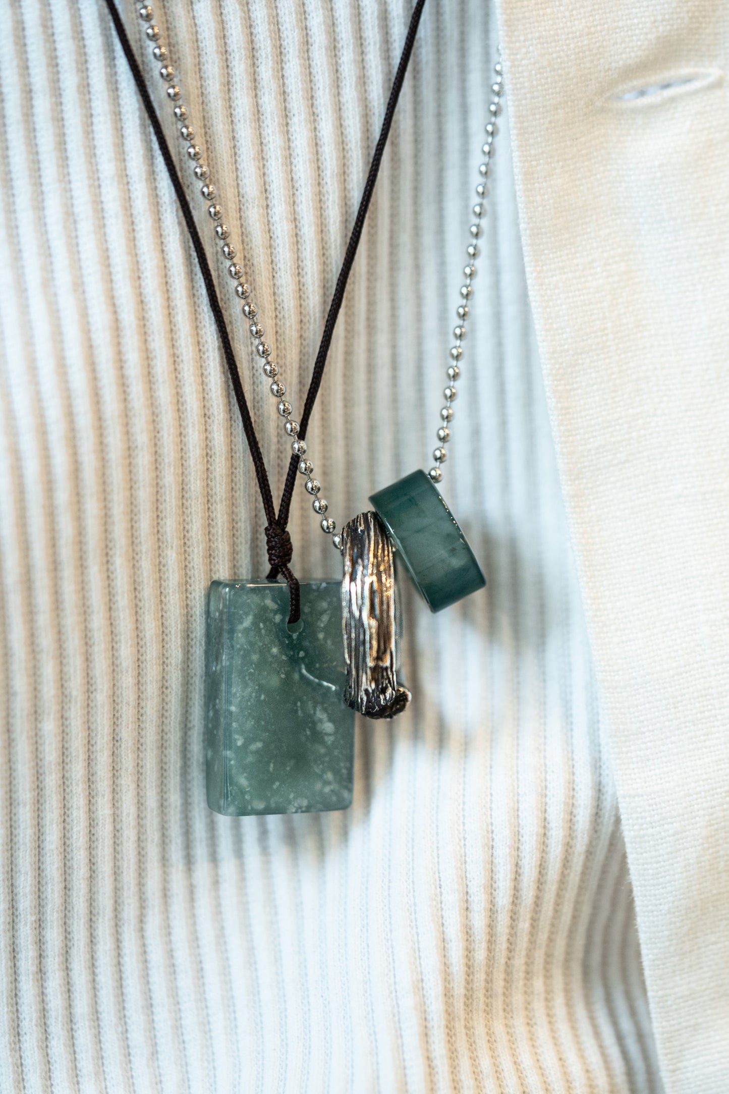 Light Bluish Green Jadeite Tag with White patches matches with Bluish Green Jadeite Ring Pendant and Enso Pendant hung on a 925 Silver Chain