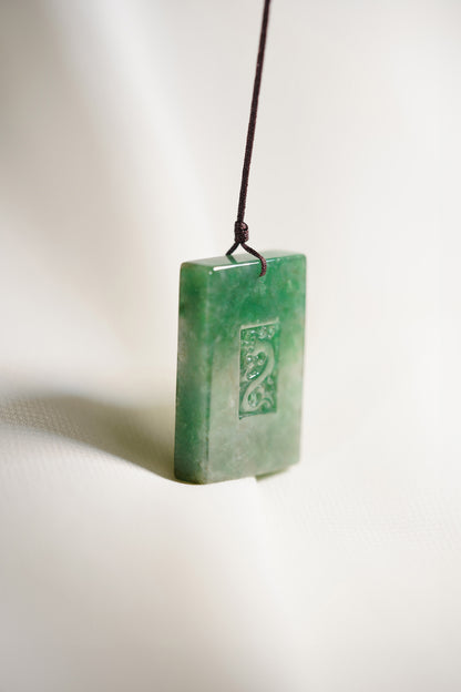 Medium Green Jadeite Engraved Dragon Tag with Pale Green patches