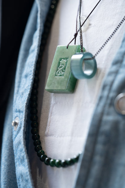 Medium Green Jadeite Engraved Dragon Tag with Pale Green patches