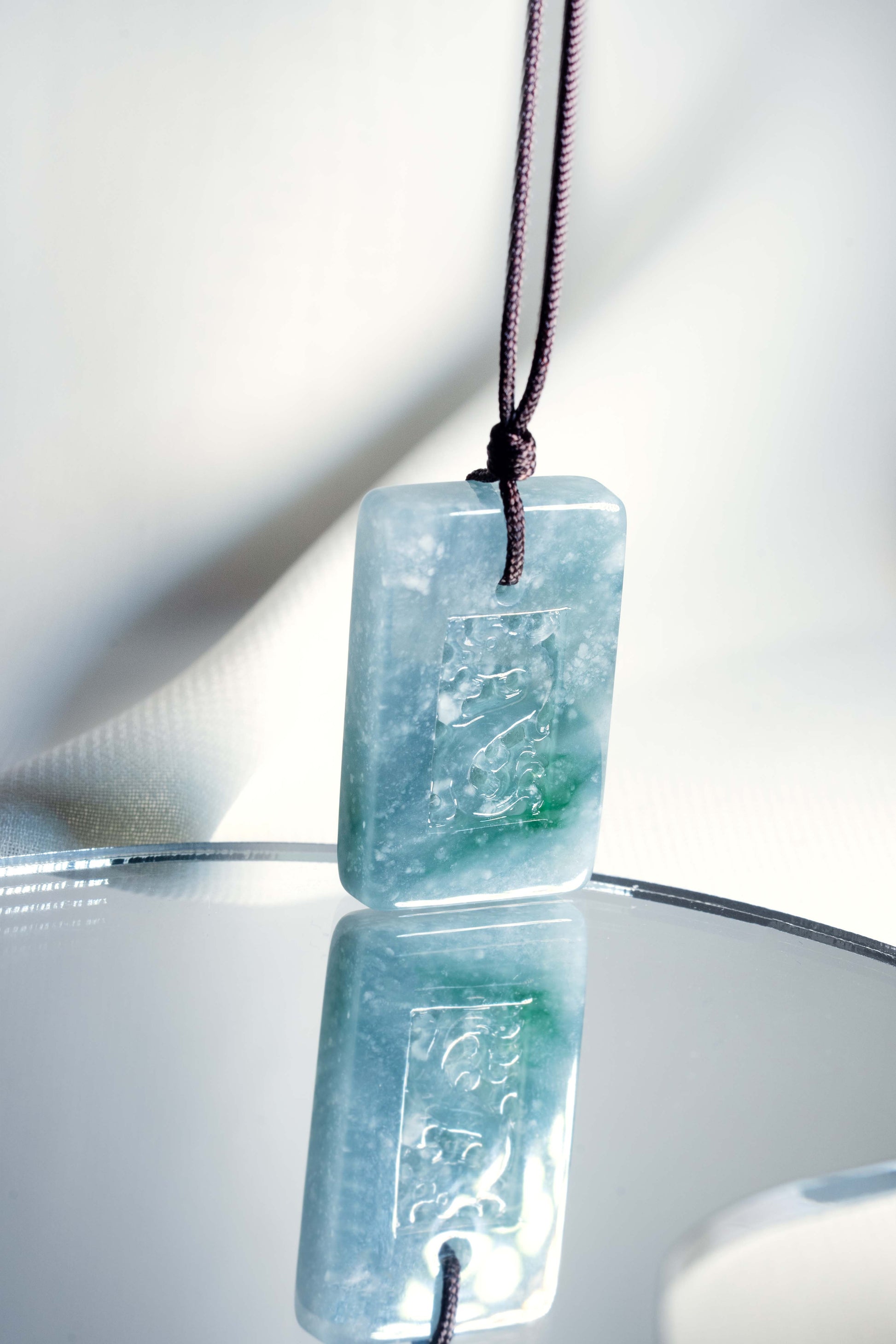 Medium Bluish Green Jadeite Tag with Engraved Dragon