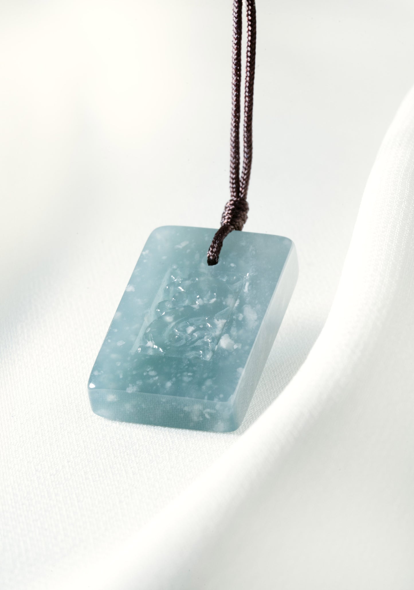 Medium Bluish Green Jadeite Tag with Engraved Dragon