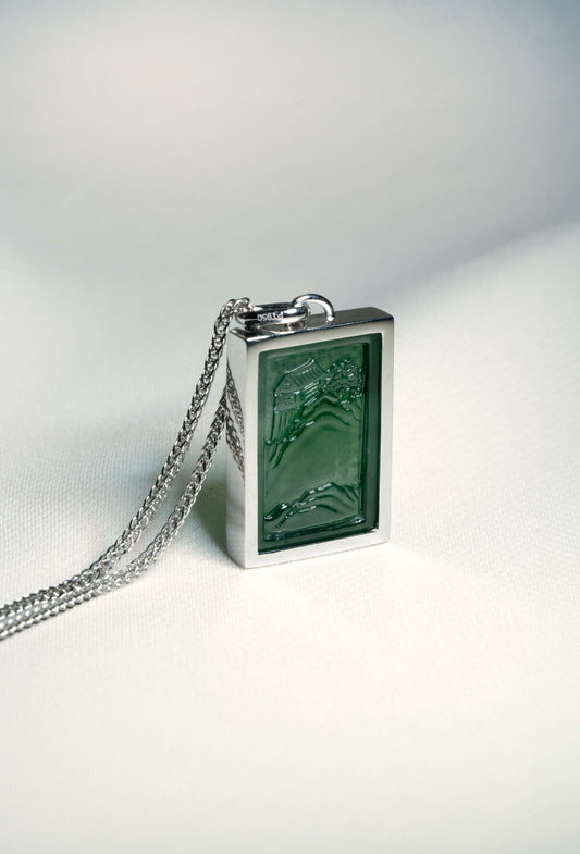 Carved Bluish Green Jadeite Tag with Platinum Frame hung on a 925 Silver Chain