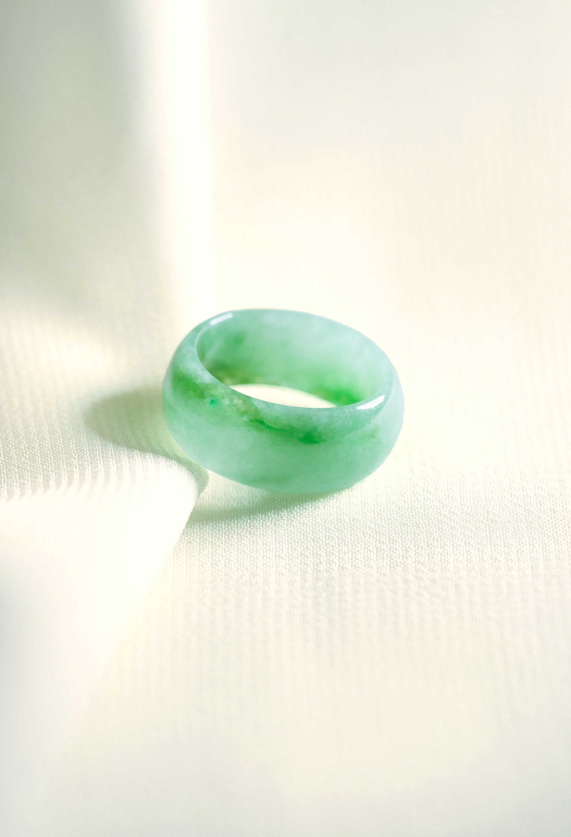 Pale Green Jadeite Ring with Medium and Intense Green patches