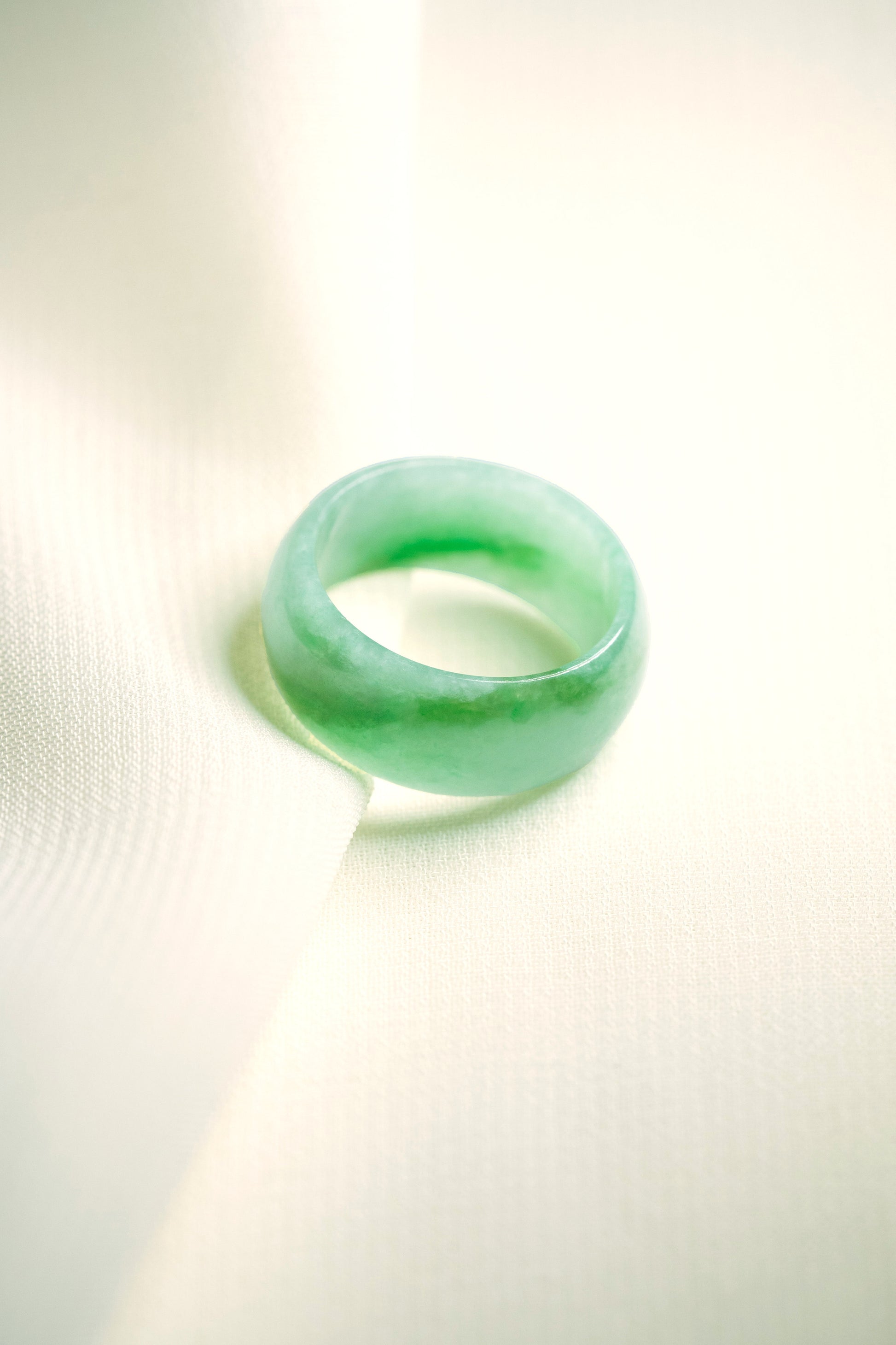 Pale Green Jadeite Ring with Medium and Intense Green patches