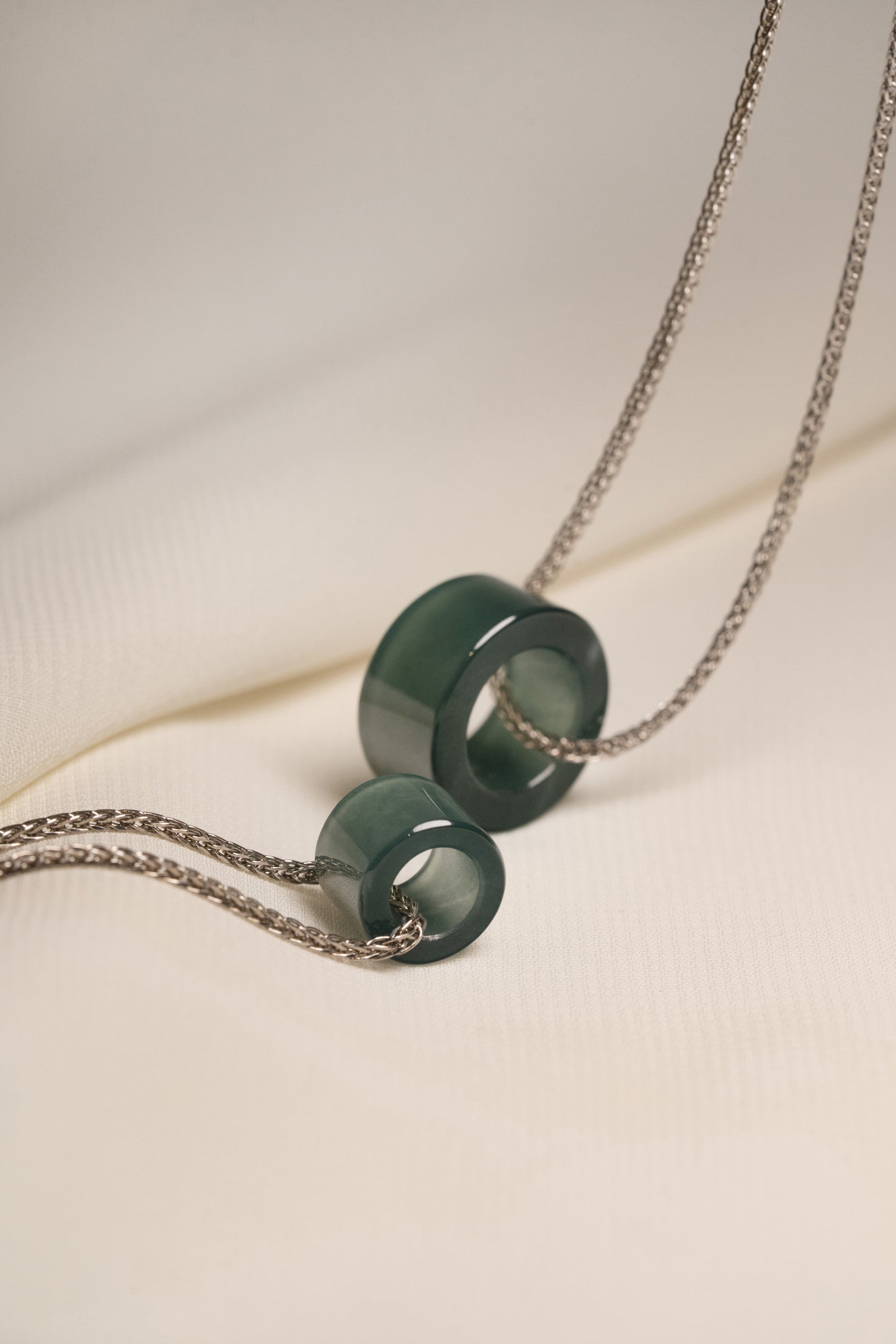 Intense Bluish Green Jadeite Ring Pendants on 925 Silver Chains