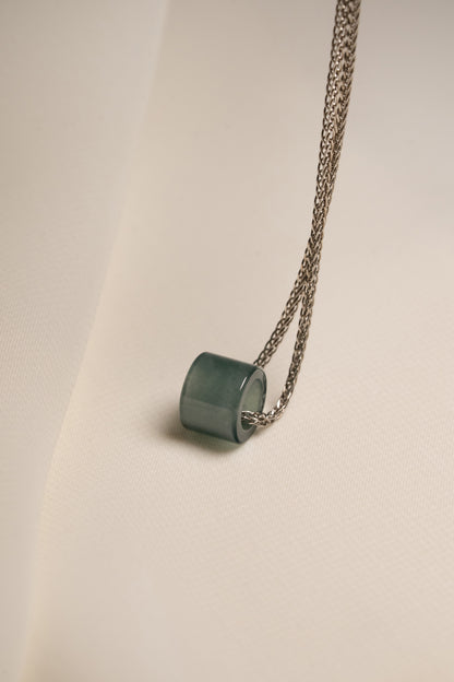 Small Intense Bluish Green Jadeite Ring Pendant hung on a 925 Silver Chain
