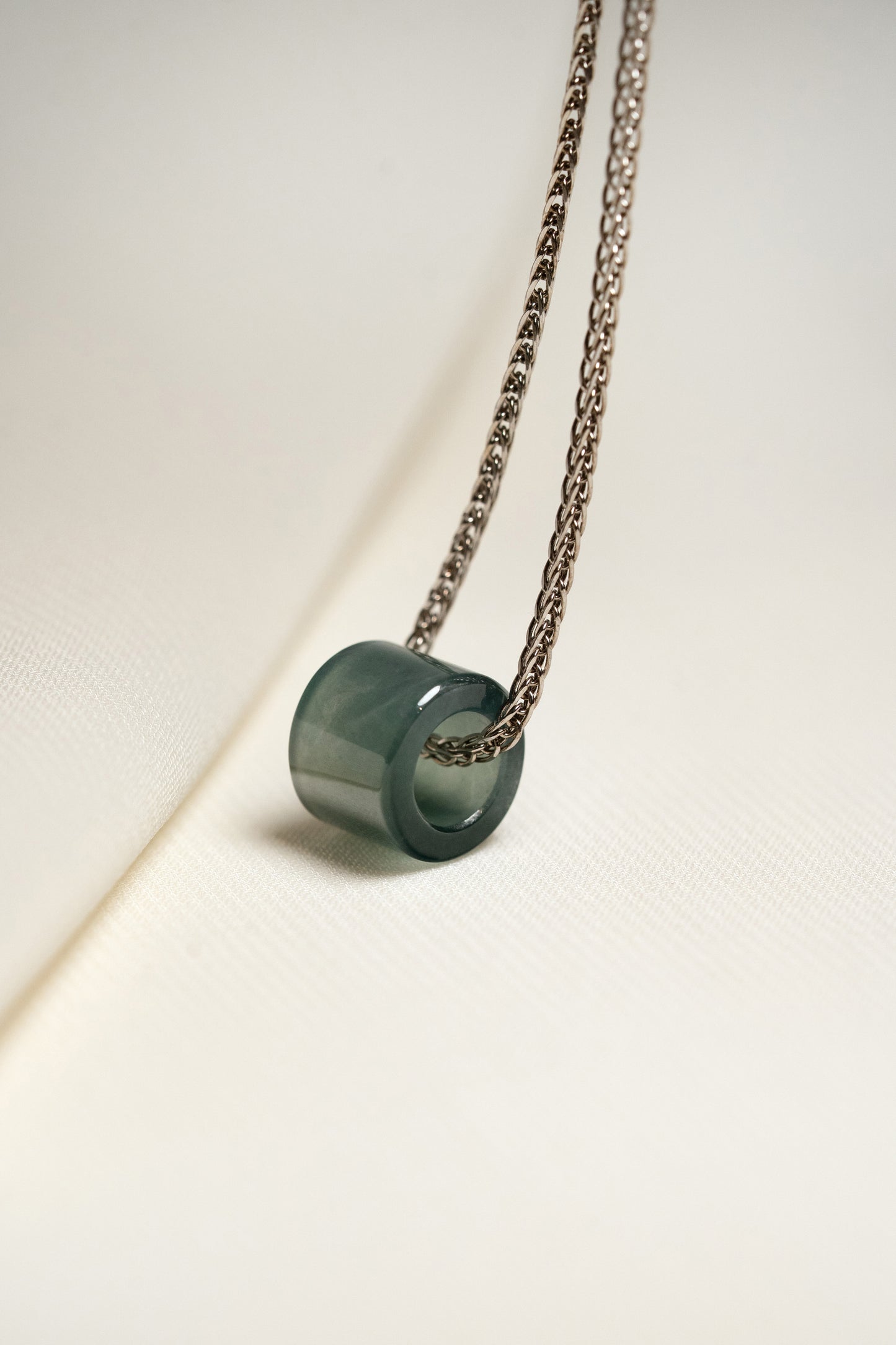 Small Intense Bluish Green Jadeite Ring Pendant hung on a 925 Silver Chain