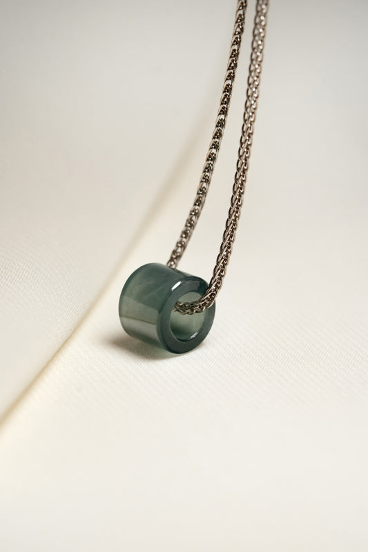 Small Intense Bluish Green Jadeite Ring Pendant hung on a 925 Silver Chain