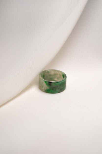 White Jadeite Ring with Medium Green and Black Patches