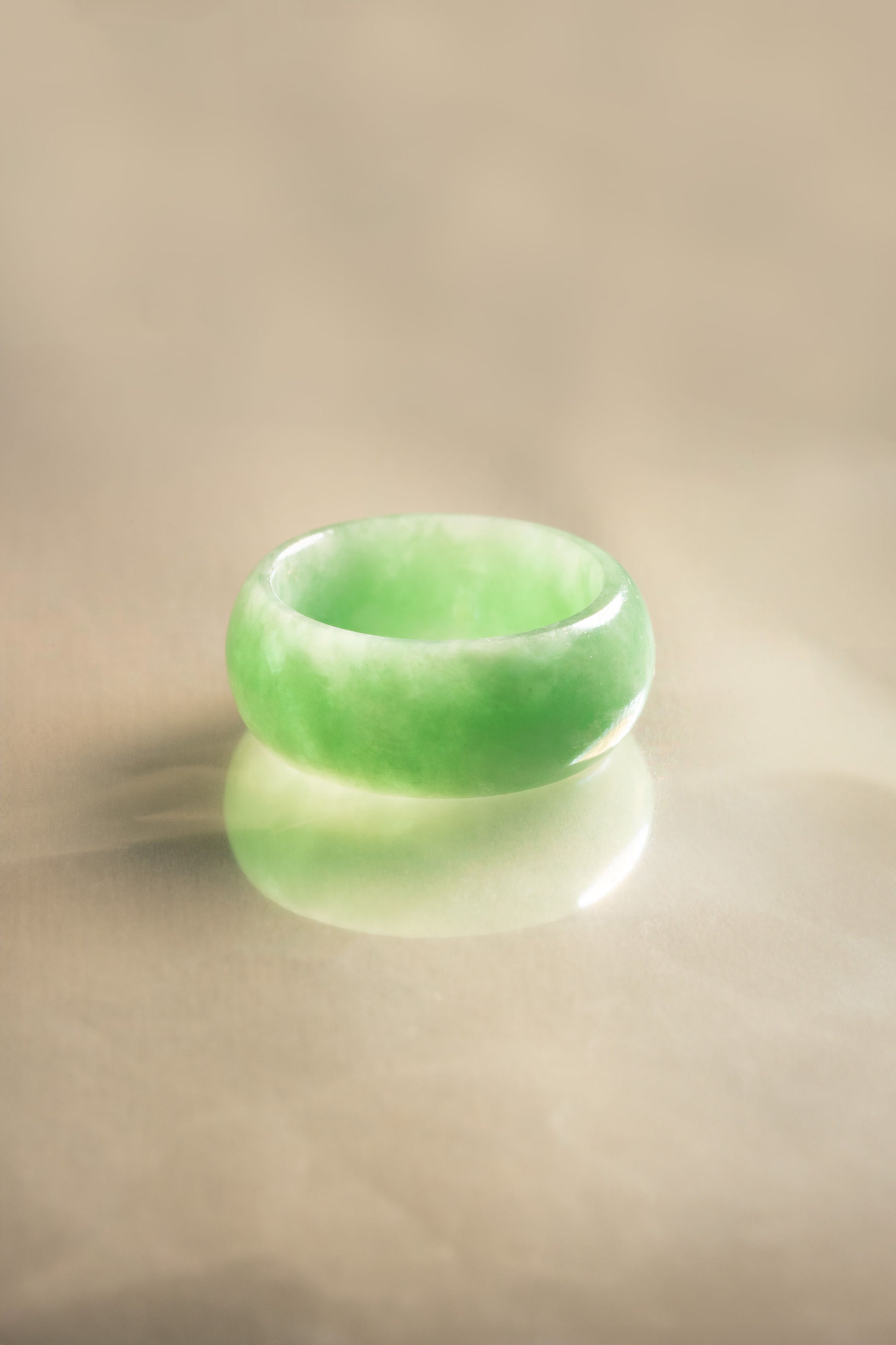 Light Green Jadeite Ring with Medium Green patches