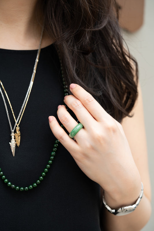 Intense Green Jadeite Ring with Pale Green patches