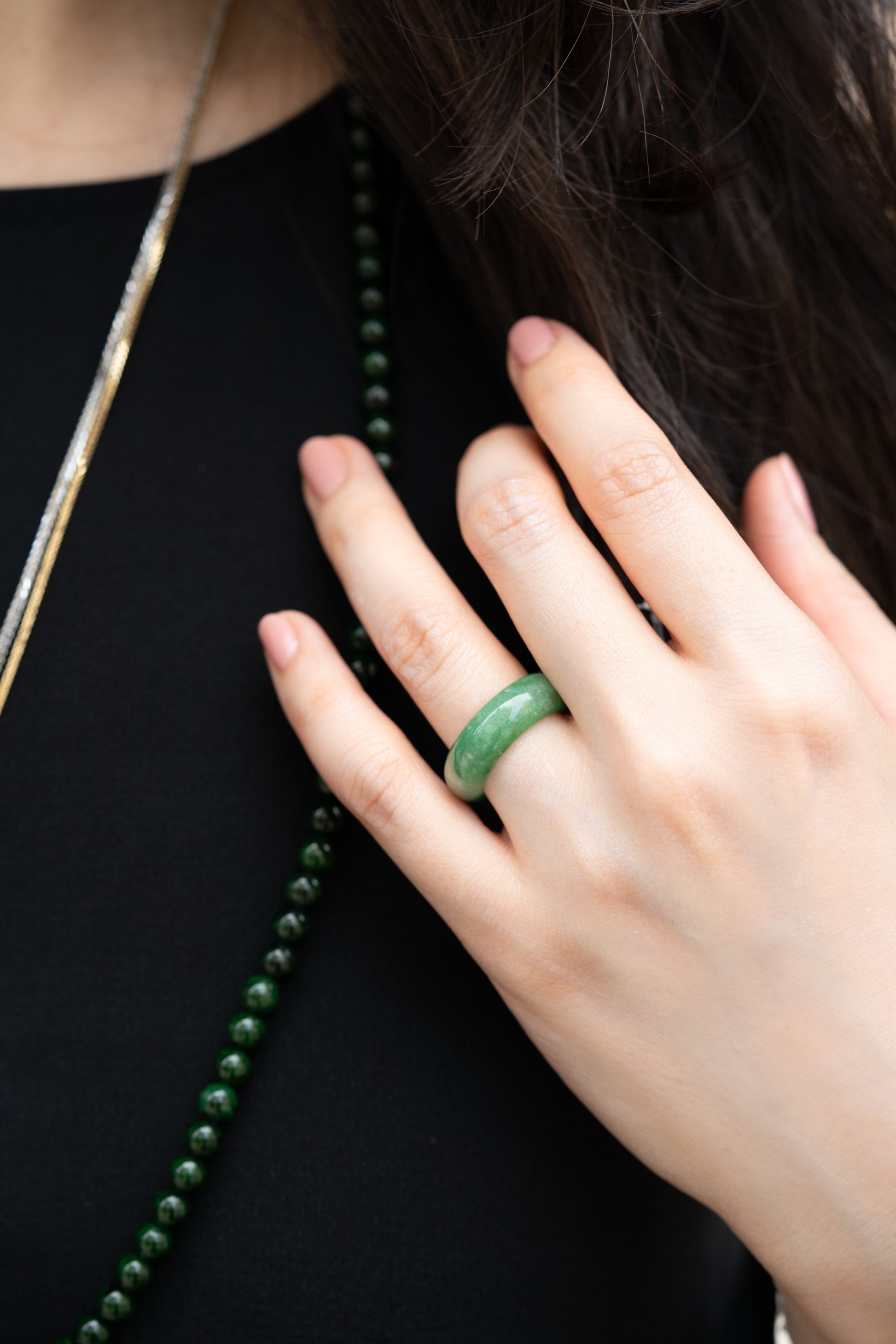 Intense Green Jadeite Ring with Pale Green patches