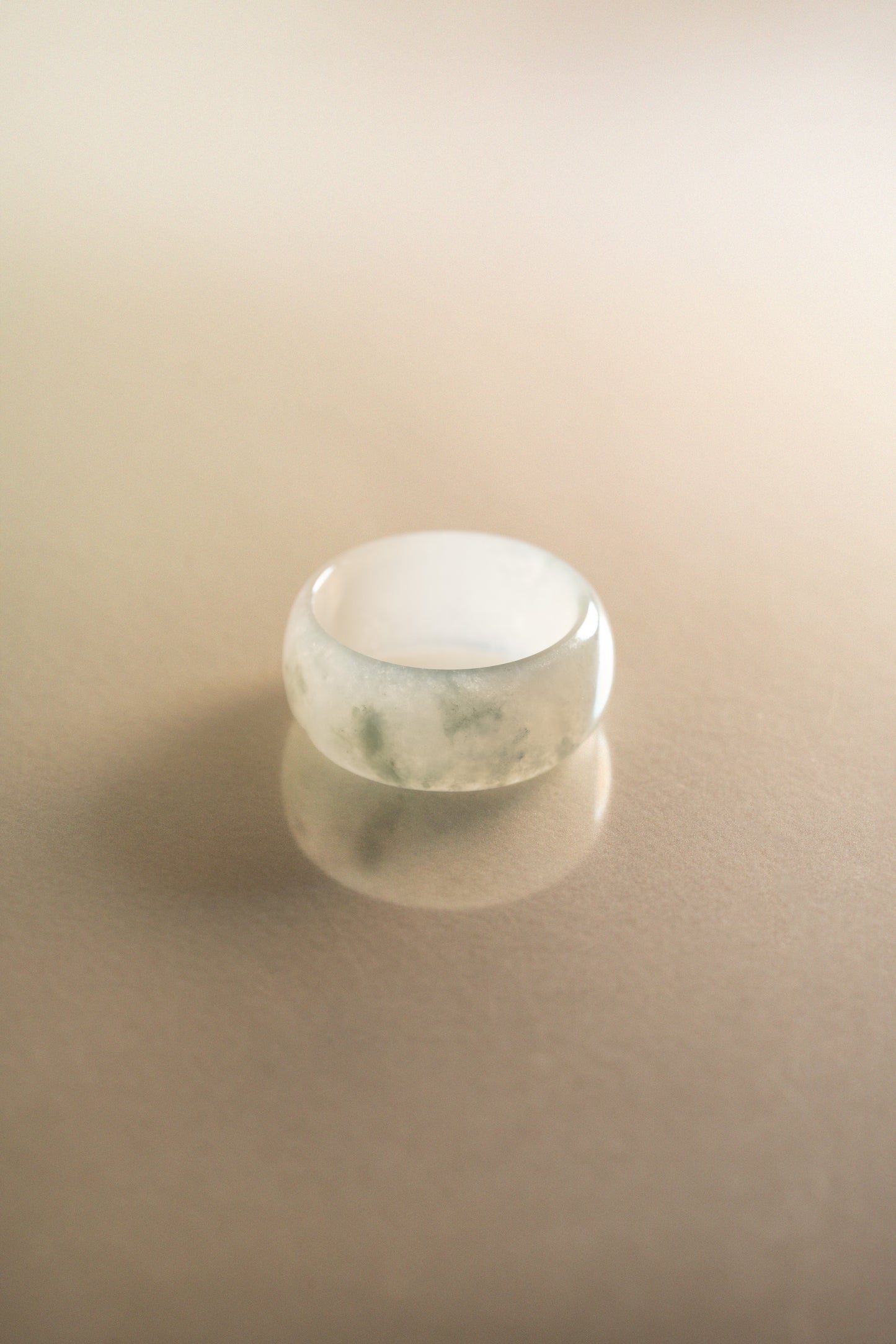 White Jadeite Ring with Bluish Green patches