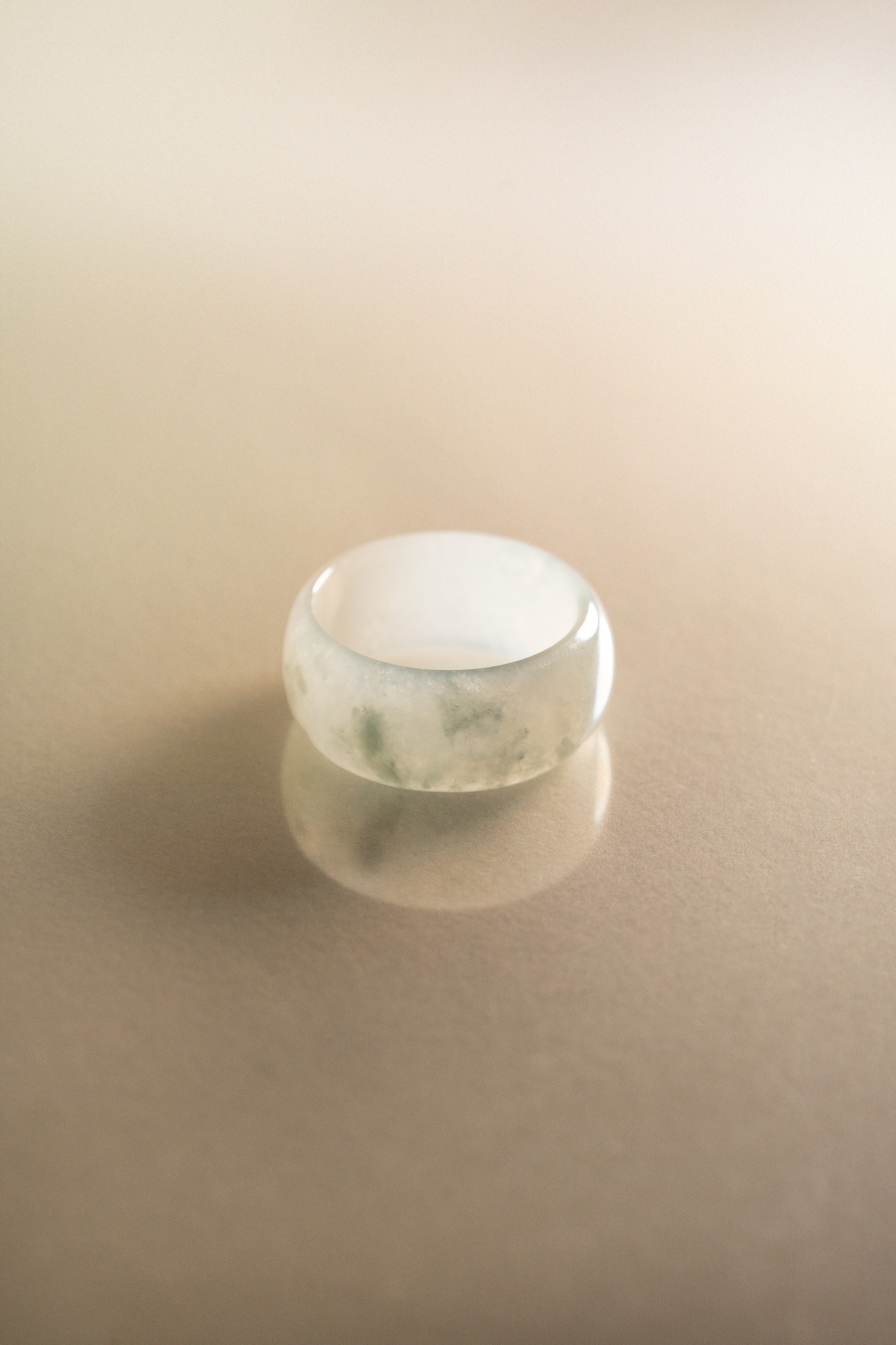 White Jadeite Ring with Bluish Green patches