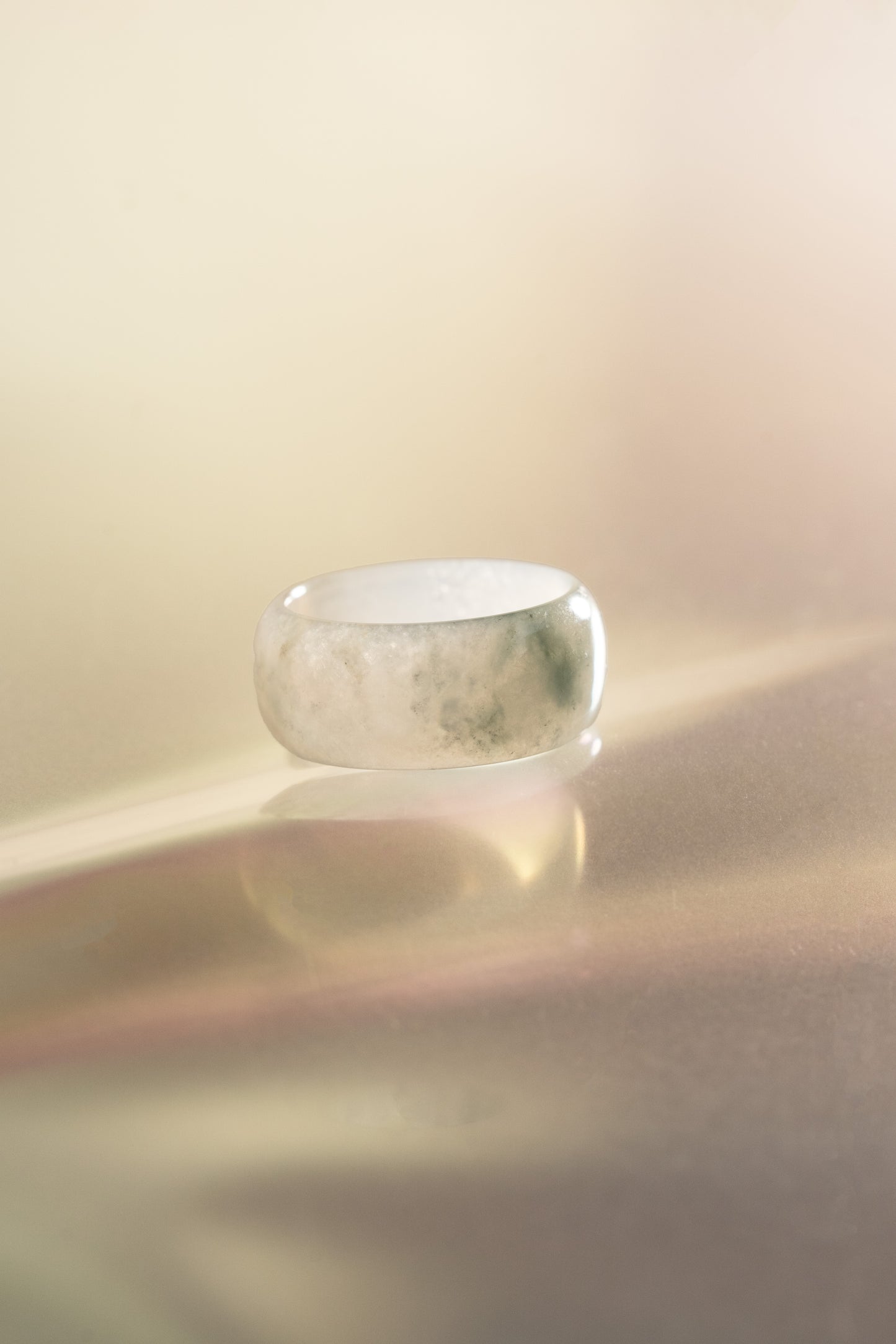 White Jadeite Ring with Bluish Green patches