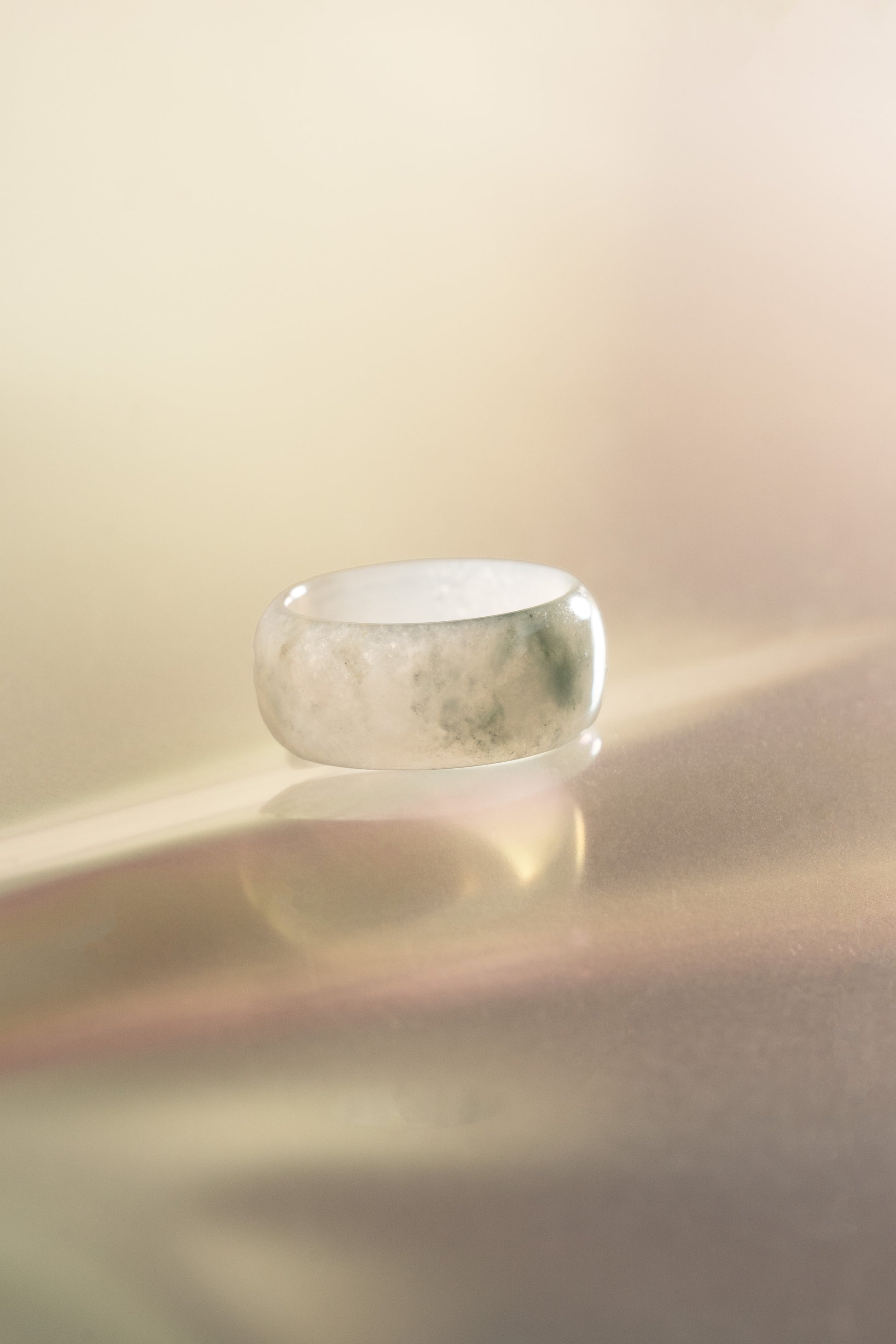 White Jadeite Ring with Bluish Green patches
