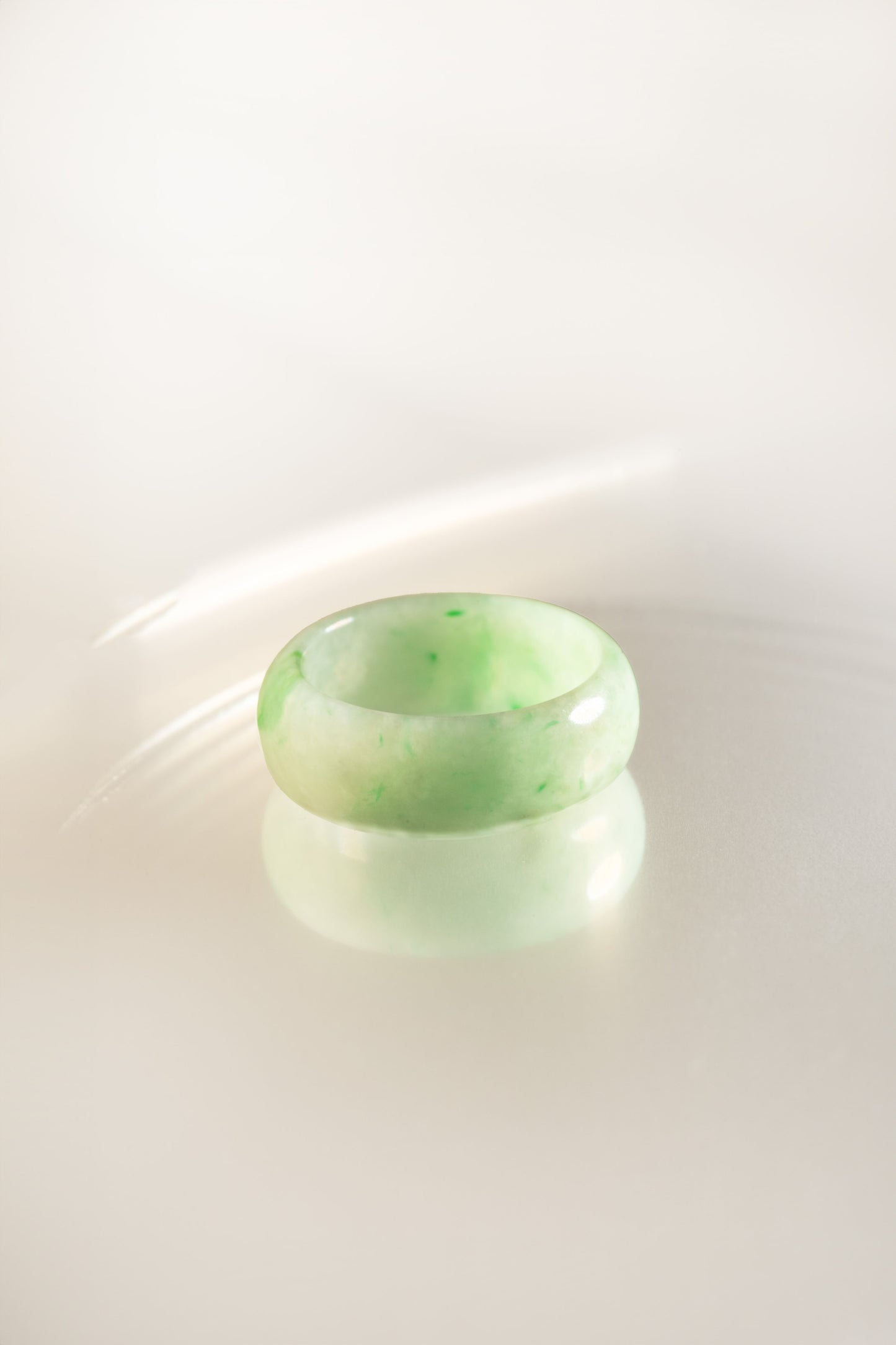 Pale Green Jadeite Ring with Light and Medium Green patches