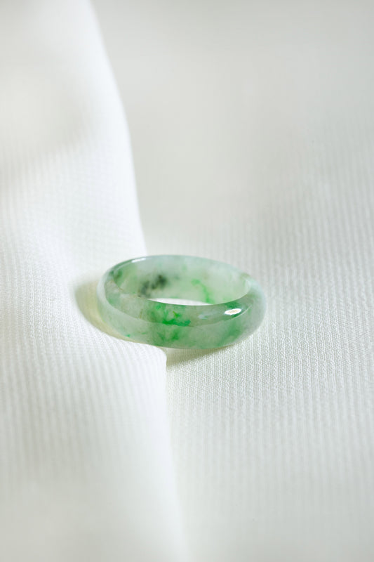 Intense Green Jadeite Ring with Pale Green patches