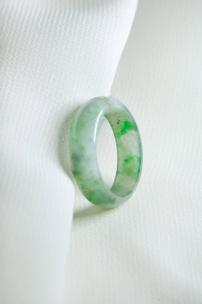 Intense Green Jadeite Ring with Pale Green patches