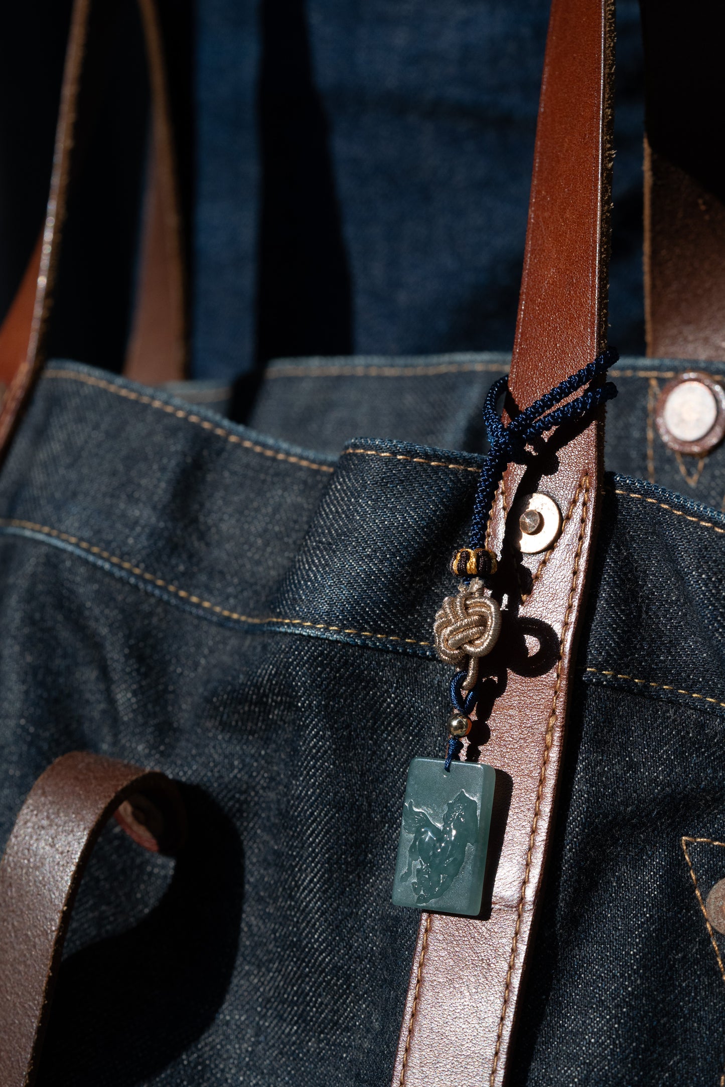 Zodiac Horse in Bluish Green Jadeite Jade Pendant hung on a bag