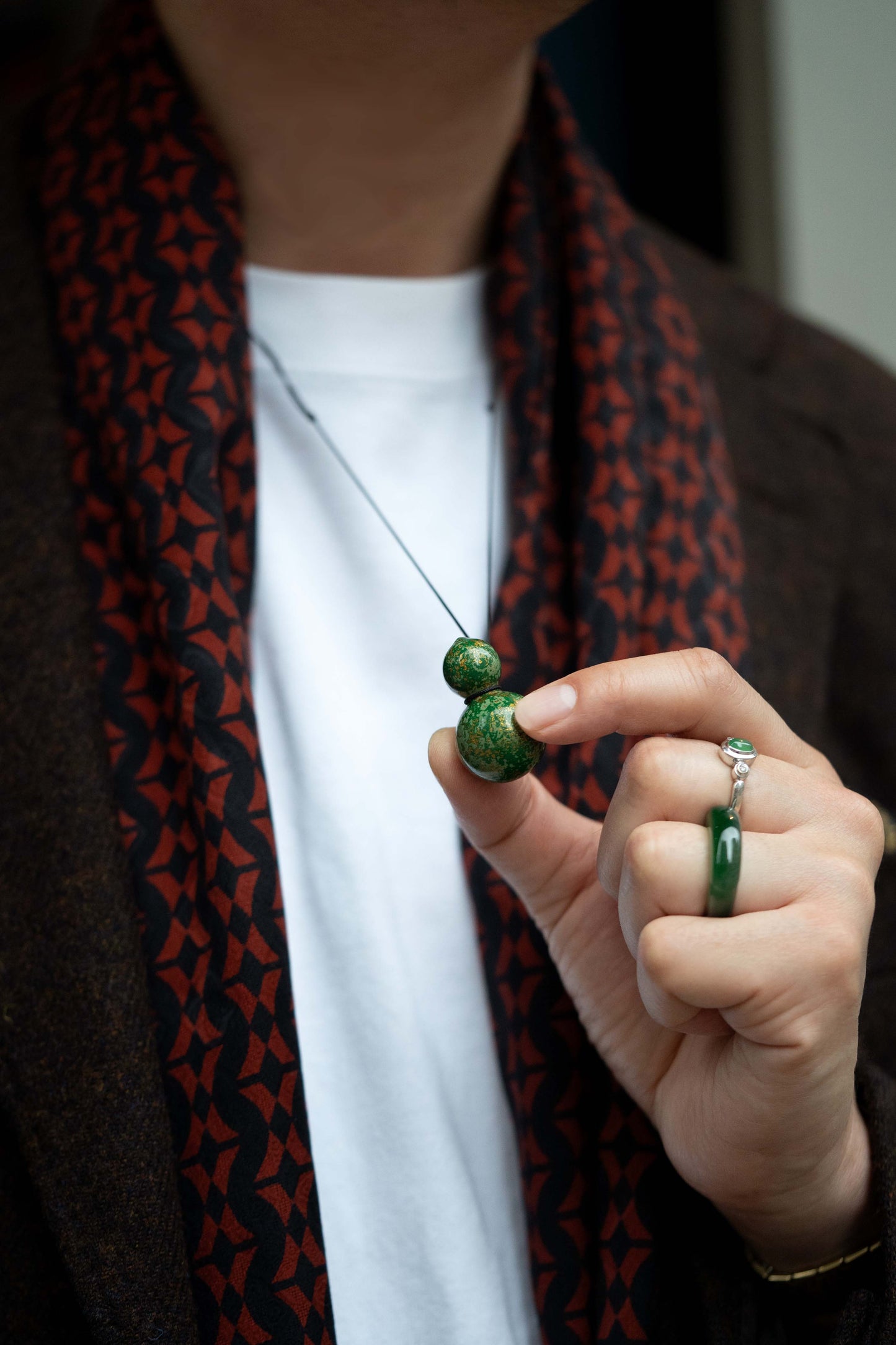 Green Multicolored Lacquer Wulu Pendant  matches with Green and Orange Motif Silk Scarf