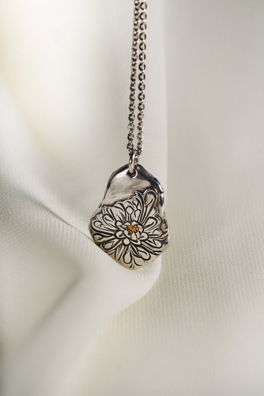 Chrysanthemum Sterling Silver Pendant with 24K Yellow Gold Accent in 13.73g hung on a 925 Silver Chain