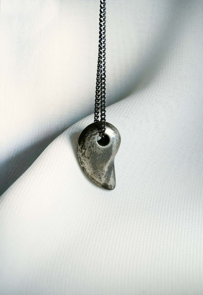 Sterling Silver Comma hung on a 925 Silver Chain