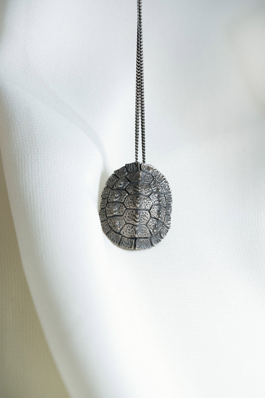 925 Silver Turtle Shell Pendant hung on a Black Sterling Silver Chain