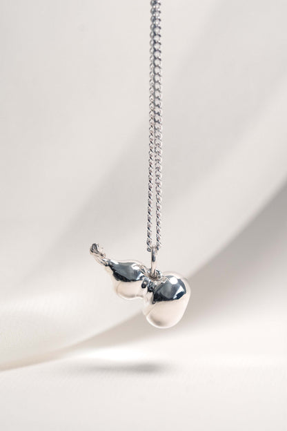 Sterling Silver Wulu Pendant hung on a 925 Silver Chain