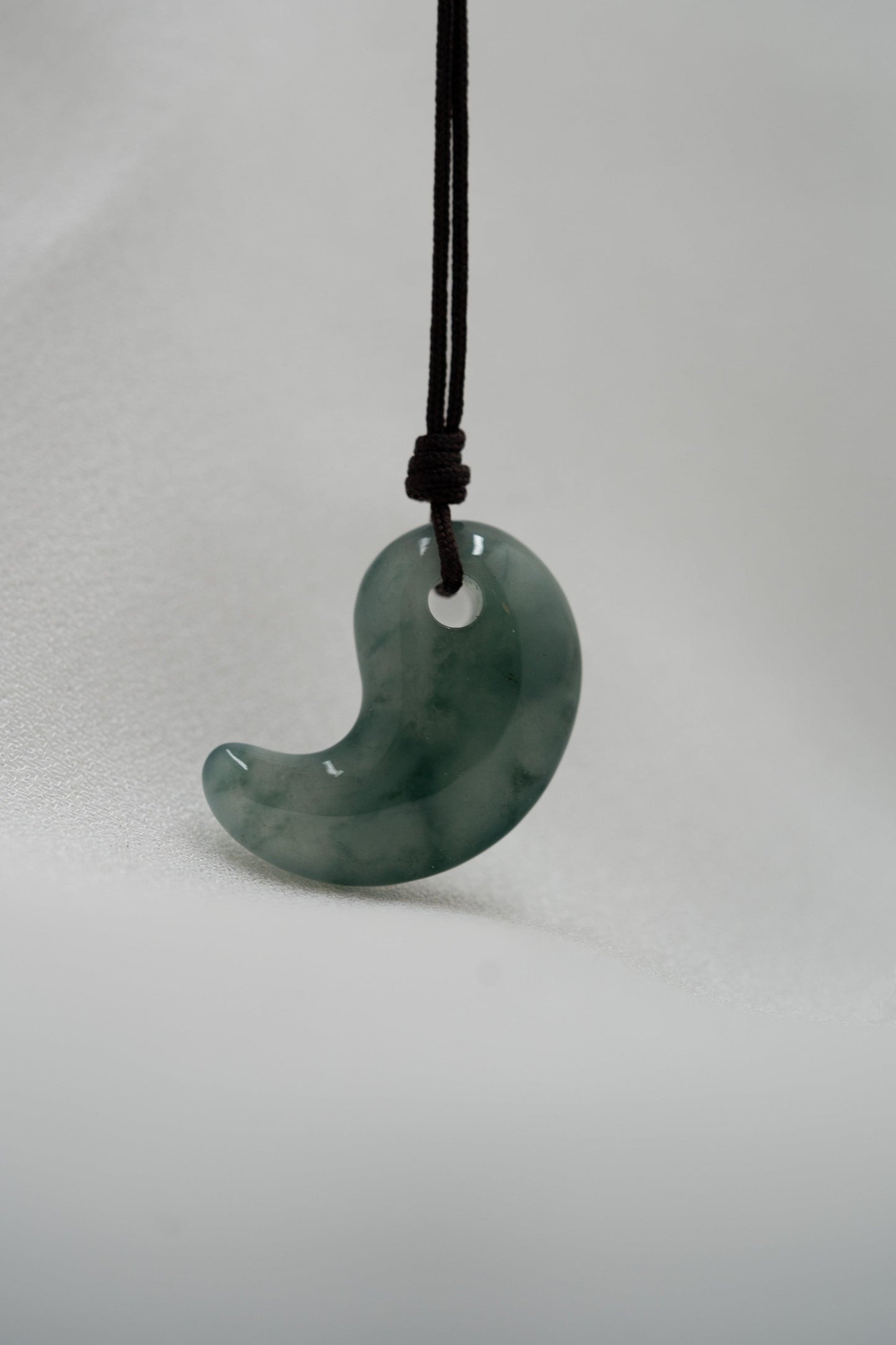 Light Bluish Green Jadeite Comma with Deep Bluish Green patches - Meilan Jewelry & Arts Ltd