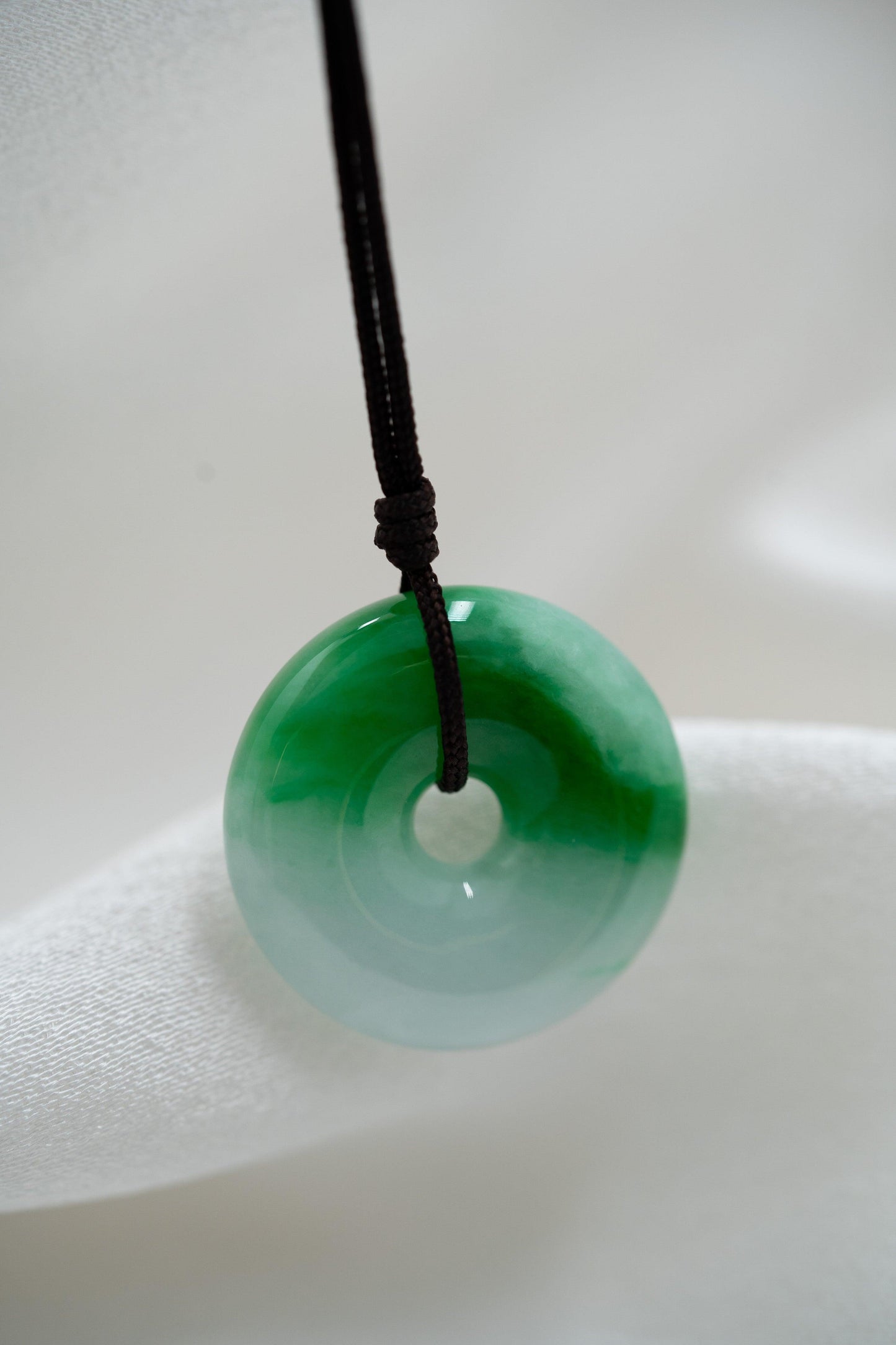White Jadeite Zen Doughnut with Green patches - Meilan Jewelry & Arts Ltd