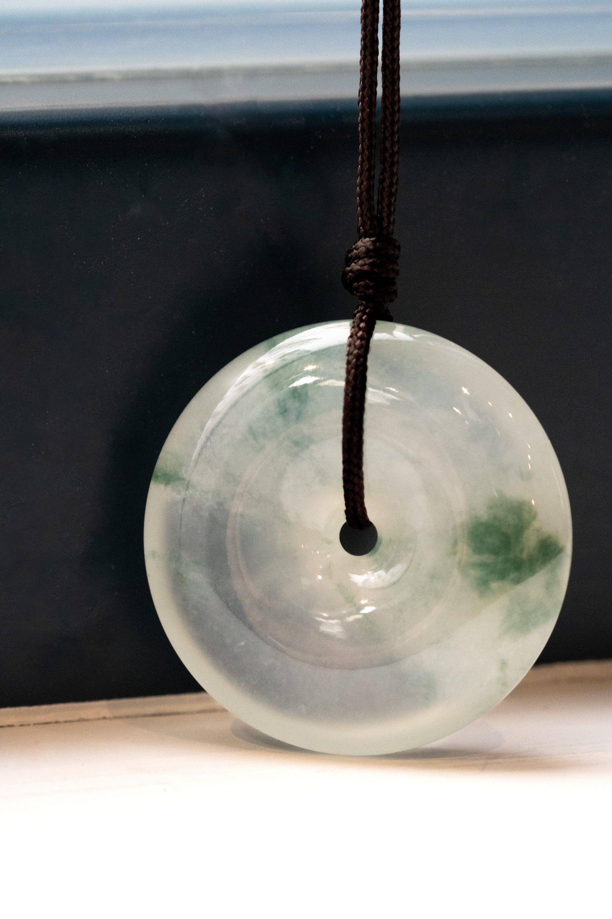 White Jadeite Zen Doughnut with Intense Green patches - Meilan Jewelry & Arts Ltd
